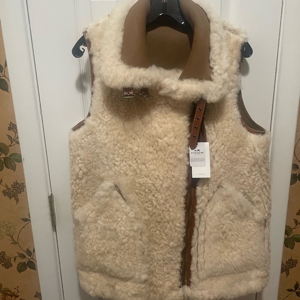 Coach  Lamb leather/shearling natural/ivory reversible Vest. - Picture 10 of 16
